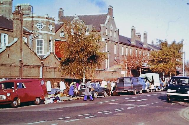 Known as the 'totters’ market’ this was the scene on a Friday morning pre-April 1976. Behind the wall was the dockyard branch railway.