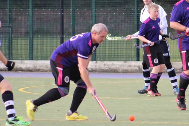Portsmouth 4ths Alistair Thompson in possession in their meeting with Gosport 2nds