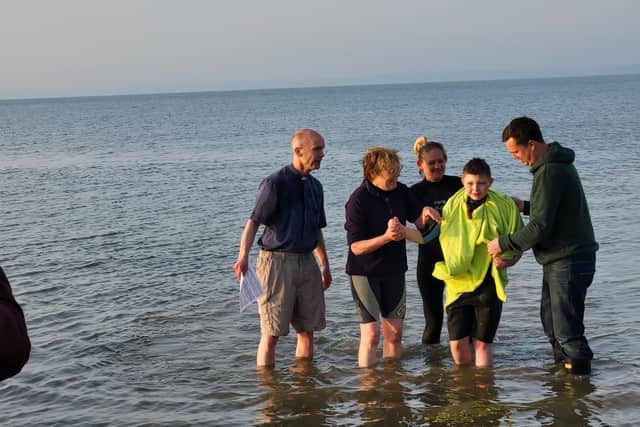 12-year-old Dexter Lupton had a sea baptism on Easter Sunday.