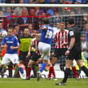 David Norris unleashes a stunning left-foot volley to snatch a point at the death for Pompey against Southampton. Picture: Chris Ison