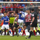 David Norris unleashes a stunning left-foot volley to snatch a point at the death for Pompey against Southampton. Picture: Chris Ison