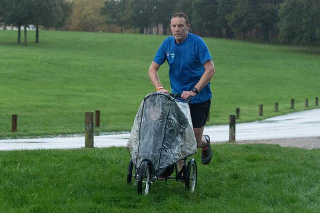A pram-pushing Ray Gunner taking part in the latest Fareham parkrun.
Picture: Keith Woodland