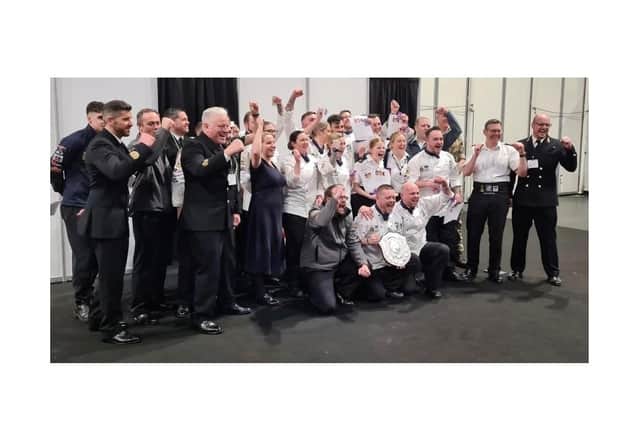 Top chefs: The team of Royal Navy cooks celebrate being crowned the best military chefs in Britain.