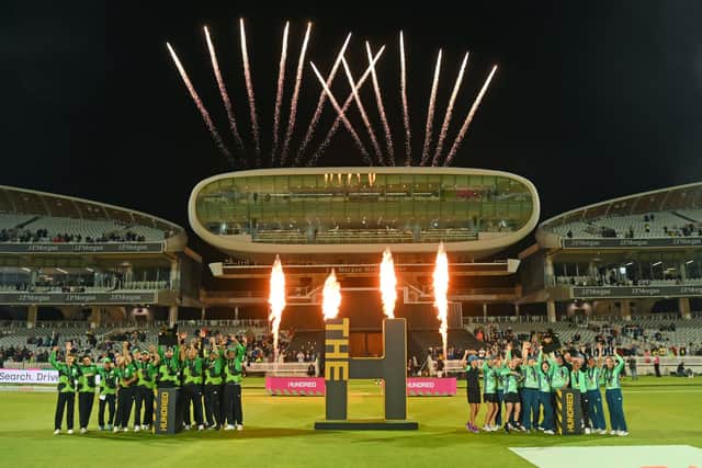 Champions The Southern Braves (left) and the Oval Invincibles parade their trophies  at Lord's last night. Photo by Stu Forster/Getty Images.