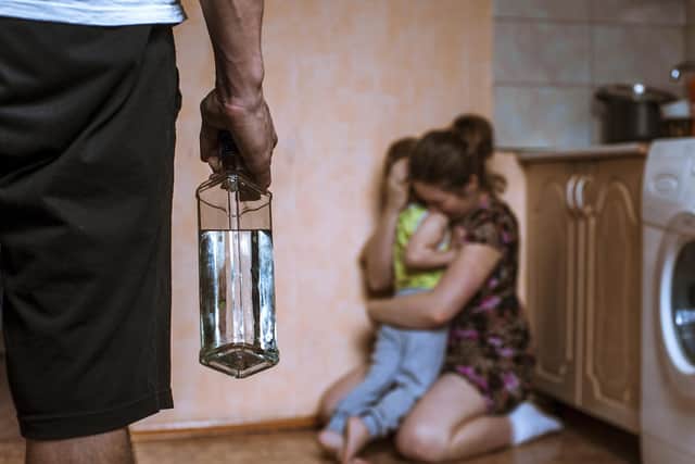 Domestic violence support needs to improve, a charity leader has urged. Photo posed by models.