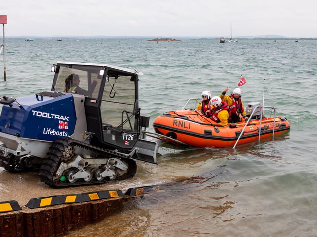 RNLI lifeboats being 'captured' by the specialist vehicles at the Portsmouth Lifeboat Station. Picture: Mike Cooter (310824)