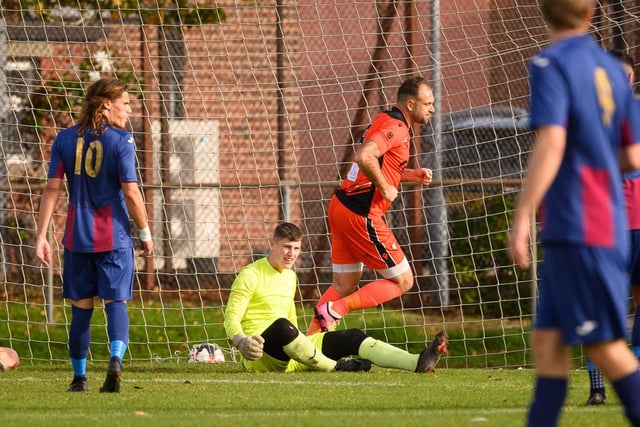 Brett Pitman wheels away after scoring his second goal. Picture: Keith Woodland