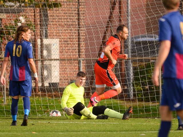 Brett Pitman wheels away after scoring his second goal. Picture: Keith Woodland