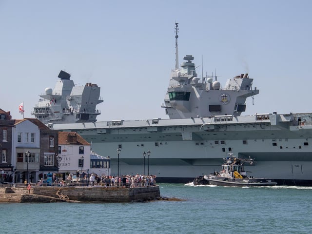 HMS Prince of Wales leaving Portsmouth on Friday 2nd August 2024Pictured: View of HMS Prince of Wales going past Spice IslandPicture: Habibur Rahman