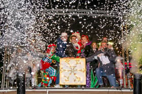 New Theatre Royal Panto Cast, Deputy Mayor Tom Coles and Ronan Curtis switching the Christmas lights on