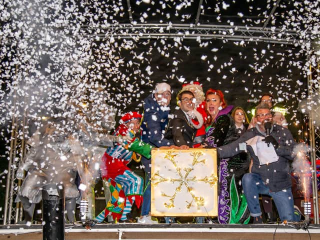 New Theatre Royal Panto Cast, Deputy Mayor Tom Coles and Ronan Curtis switching the Christmas lights on