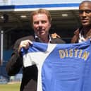 Harry Redknapp welcomes Sylvin Distin to Fratton Park