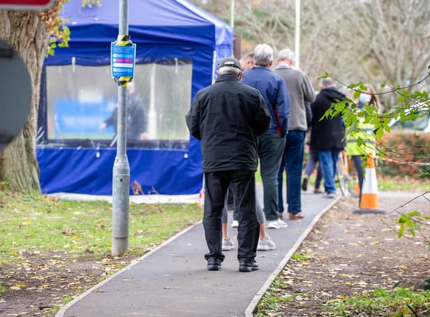 Pictured: People queuing to get their booster jab at  the Covid-19 vaccination centre at St Jame s Hospital, Portsmouth

Picture: Habibur Rahman