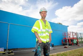 Artist, My Dog Sighs, begins to paint a mural on the building of Hilsea Lido Swimming Pool on 20th July 2020. 

Pictured:  Artist, My Dog Sighs.

Picture: Habibur Rahman