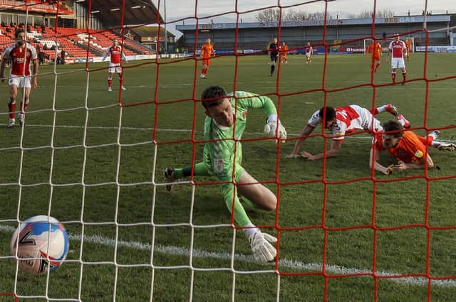 John Marquis of Portsmouth scores their first goal to make the score 0-1 during the Sky Bet League One match between Fleetwood Town and Portsmouth at Highbury Stadium on January 16th 2021 in Fleetwood, England. (Photo by Daniel Chesterton/phcimages.com)