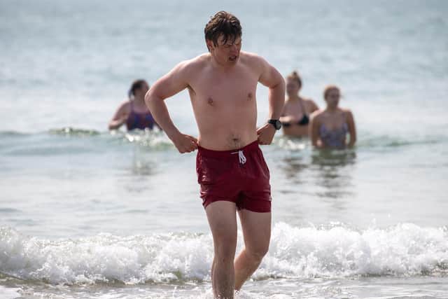 Students from University of Portsmouth braved the cold Solent water to raise money for charity Just One Ocean on Saturday morning near Southsea Pier. Picture: Alex Shute