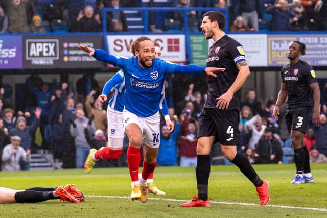 Marcus Harness celebrates opening the scoring against Morecambe in Pompey's 2-0 triumph. Picture: Stephen Flynn/ProSportsImages