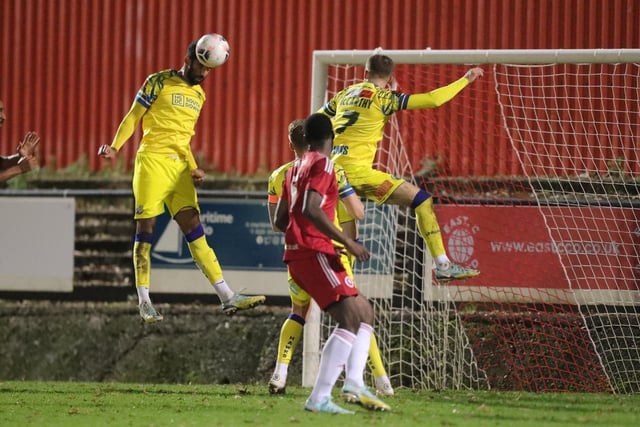 Oscar Gober, left, wins this header. Picture by Dave Haines