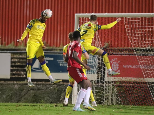 Oscar Gober, left, wins this header. Picture by Dave Haines