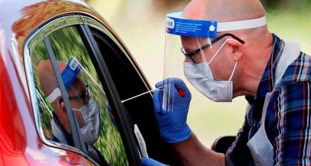 Only those with symptoms should arrange to have a test carried out (Photo: ADRIAN DENNIS/AFP via Getty Images)