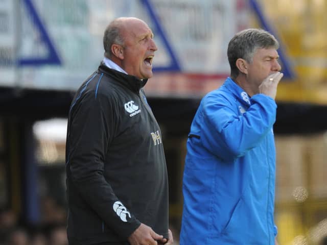 Brian Kidd (right) arrived at Pompey in February 2009 to assist caretaker boss Paul Hart. Picture: Daniel Hambury/Empics