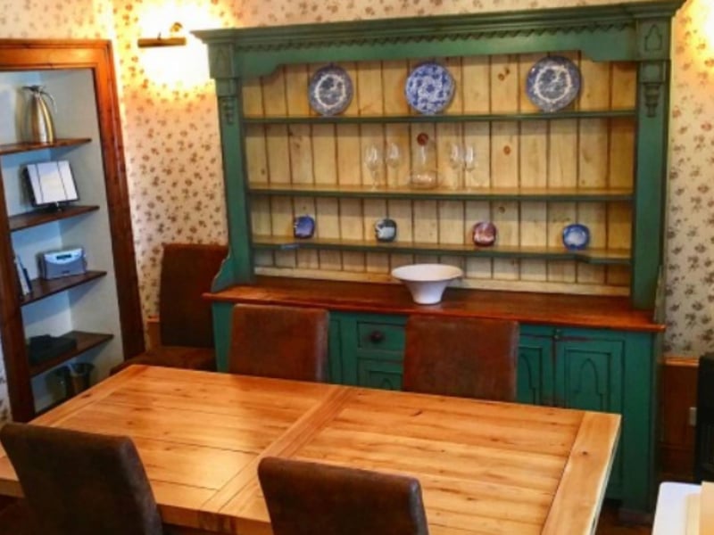 A comfortable dining area is perfect for an evening meal.