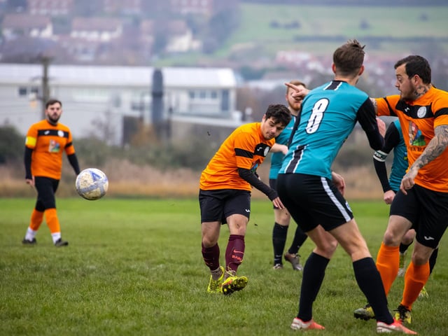 Bransbury Wanderers Reserves (orange) v Farlington Rovers. Picture by Alex Shute