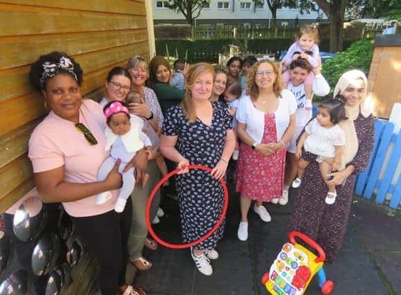 Home Start Portsmouth has been awarded a contract from Portsmouth City Council. The money received will go towards offering more services.
Pictured: Natasha Turner from Home-Start Portsmouth (centre, left), with Cllr Suzy Horton (centre, right) and families at Somerstown Family Hub.