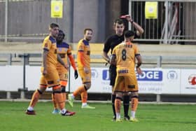 Billy Clifford is shown the red card after his second bookable offence at Dartford. Picture: Kieron Louloudis.