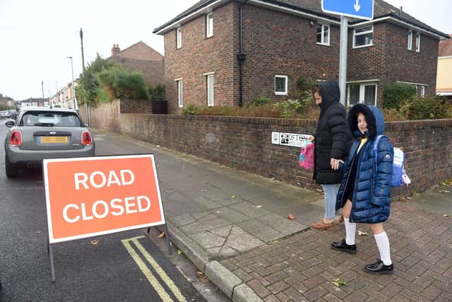 Pictured is: Nicole Kozlowski (9) walking to school with her mum Madda from Portsmouth.