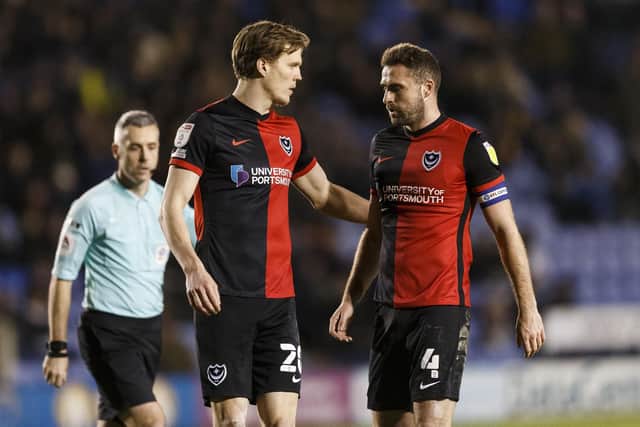 Sean Raggett is enjoying playing alongside skipper Clark Robertson in Pompey's defence. Picture: Daniel Chesterton/phcimages.com