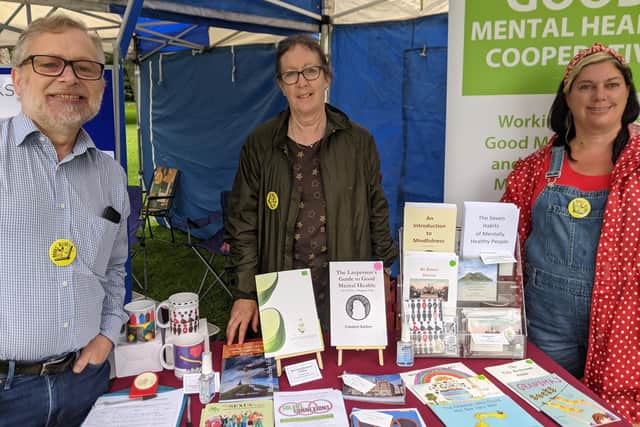 Caroline Barber, company secretary of The Good Mental Health Cooperative, with volunteers Dave Bilingham and Claire Holloway. Picture: Emily Turner