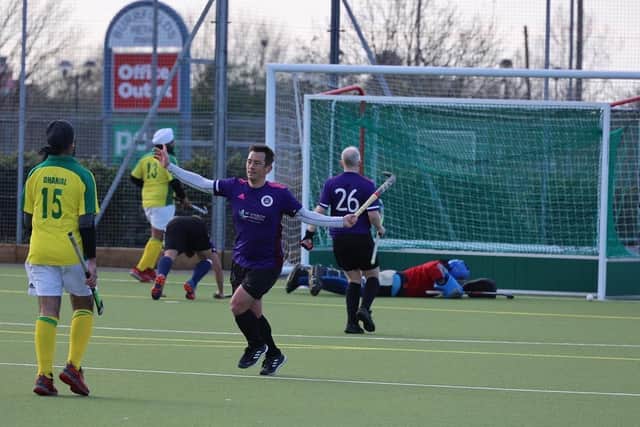 Portsmouth celebrate a goal against Indian Gymkhana. Picture: Alan Duffy