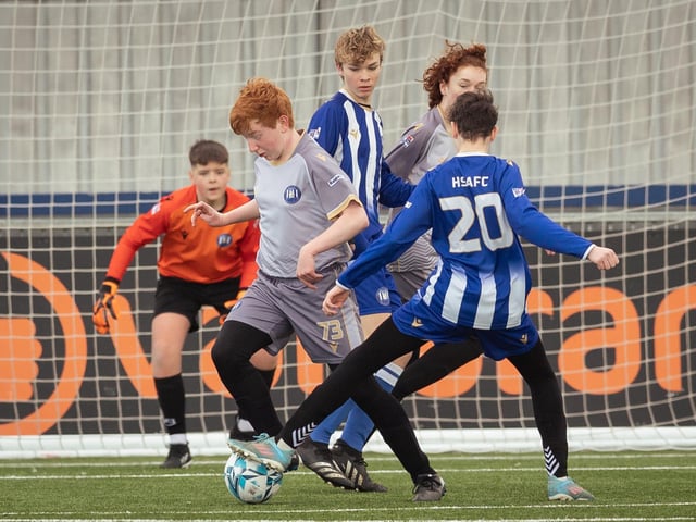Action from the U15 Campbell McFaull Invitation Cup final between Hayling St Andrews Blue and Hayling St Andrew White. Picture: Keith Woodland (260221-161)