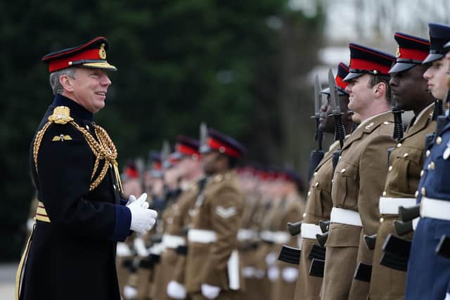 Lieutenant General Sir Christopher Tickell, deputy chief of the general staff, (left) inspects soldiers from 16 Regiment Royal Artillery as they take part in the change of colours parade at Baker Barracks on Thorney Island, the Regiment bids farewell to its Rapier missiles and welcomes in the all new state-of-the-art Sky Sabre air defence system as its ceremonial colours.