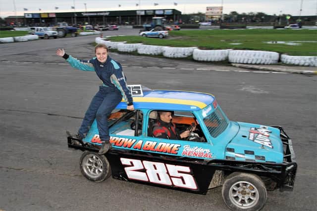 Briannie Davis hitches a lift from younger brother George.