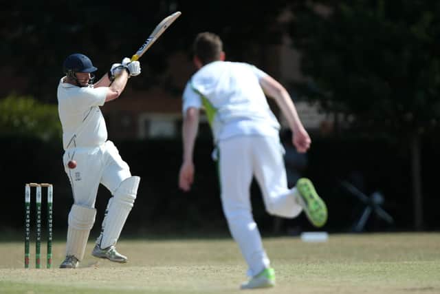 Hayling's Dave Wayman plays and misses against Emsworth. Picture: Chris Moorhouse