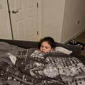 Home learning has all become a bit much for Luna the dog and Angela Smith's daughter, Kayla. Picture: Angela Smith