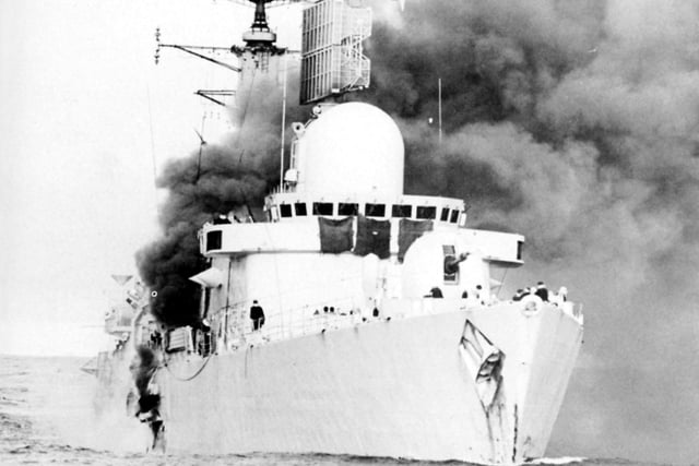 HMS Sheffield after being hit in the Falklands in 1982. Picture: Courtesy of Navy News