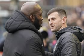 John Mousinho and Darren Moore.