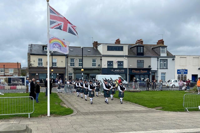 Pipers and drummers from the Houghton-Le-Spring pipe band lead the parade in Seaham.