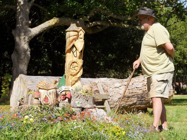 Pictured is: Veteran Nick Foot (65) from Gosport, who is a volunteer for Shore Leave at Haslar Memorial Garden where he has created sculptures around the garden. Picture: Sarah Standing (290824-5740)