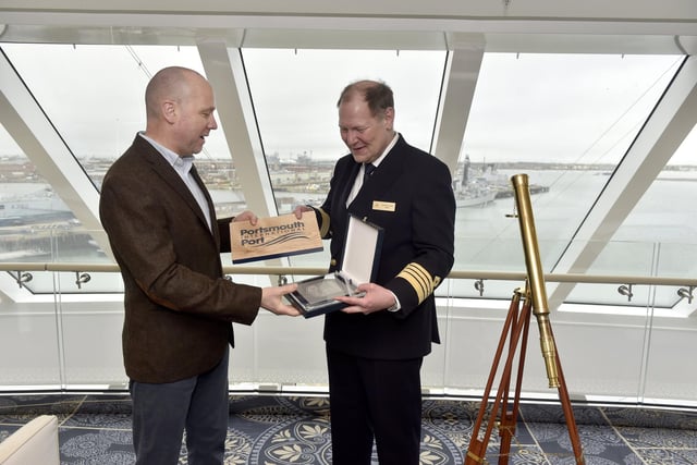 A ceremonial plaque exchange took place to mark Viking Saturn's visit. Pictured is: (l-r) Mike Sellers, port director at Portsmouth International Port and Anders Steen, master.