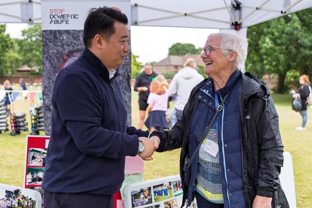 Alan Mak MP chats with a volunteer at the 2025 Bedhampton Summer Show