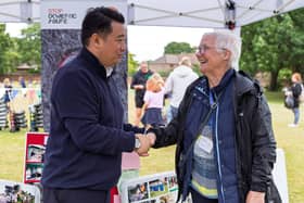Alan Mak MP chats with a volunteer at the 2025 Bedhampton Summer Show