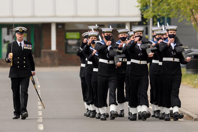 The 11 members of Perkins' Division complete their three-month training with a Divisions Ceremony in front of Commodore Huntington at HMS Collingwood.  Photo by Keith Woodland