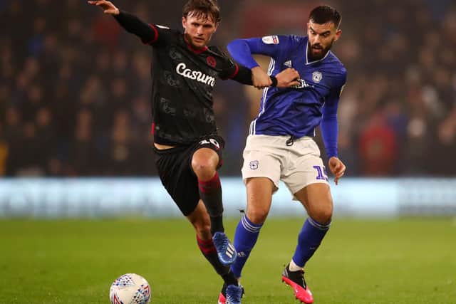 John Swift, left, with Pompey old boy Marlon Pack. Photo by Michael Steele/Getty Images