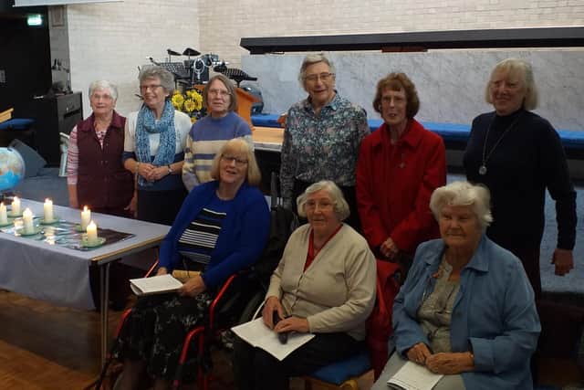 Churchgoers celebrate the World Day of Prayer. 