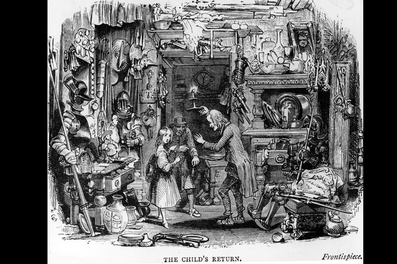 circa 1841:  Frontispiece from The Old Curiosity Shop by Charles Dickens. Amdist a shop full of bric-a-brac a young girl is welcomed by an old man carrying a candle.  Illustration by George Cuttermole  (Photo by Hulton Archive/Getty Images)