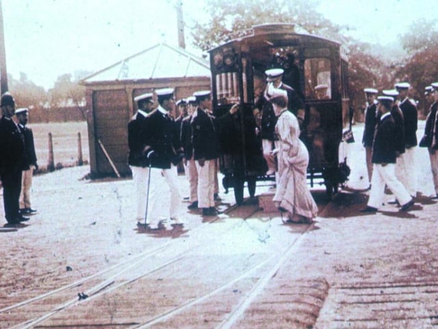 King George V and Queen Mary alighting from the Hospital Tram Railway during a visit to the hospital. The Queen also visited the hospital to meet wounded soldiers during the first world war.
